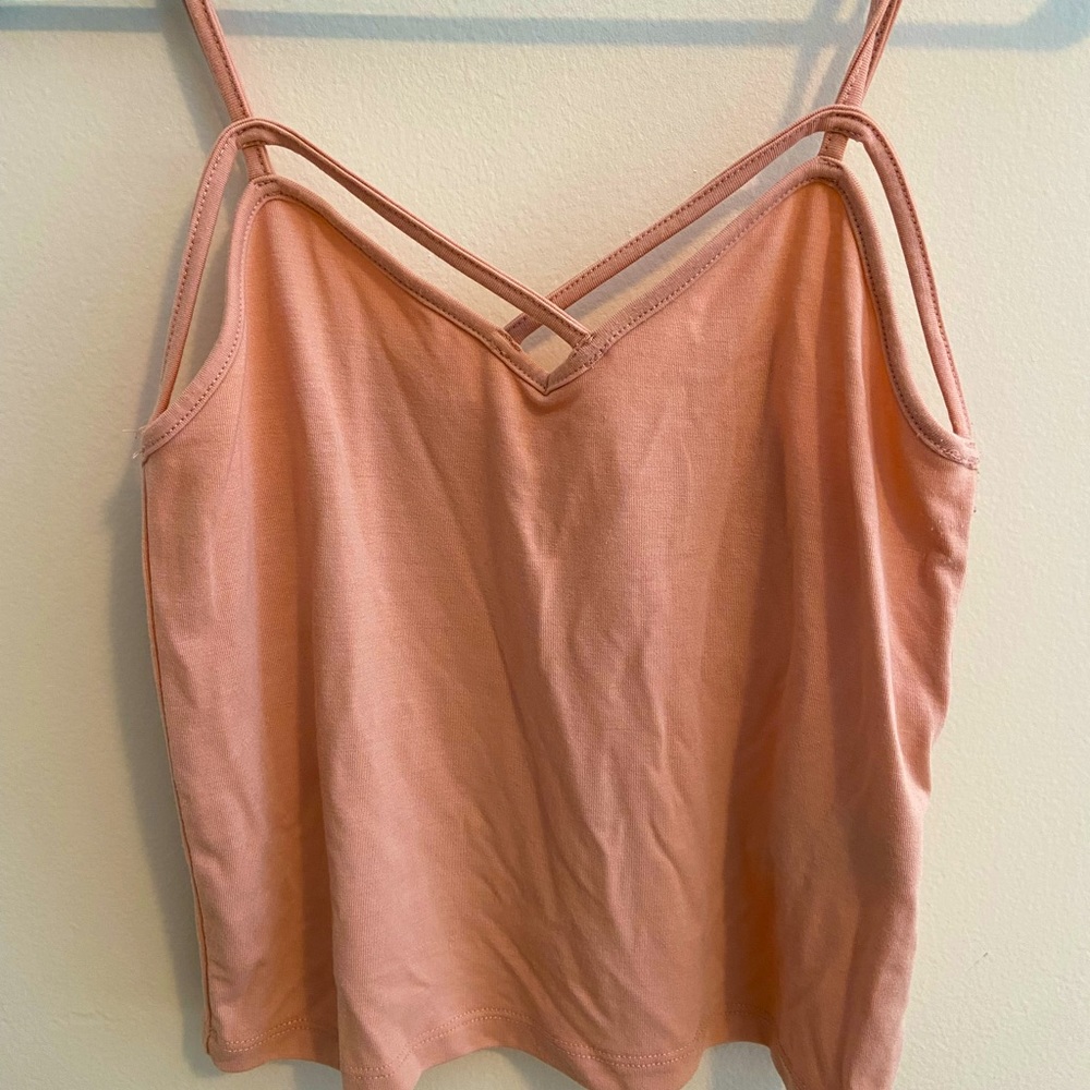 Nude color crop top.